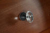 Brainerd #P23118W-472-C - 1-5/16 in. (33mm) Palermo Oval Cabinet Knob - Bronze w/Copper Highlights