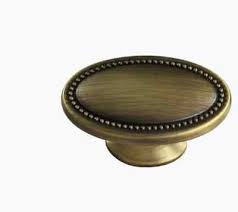 allen + roth 1.49-in Aged Brass Oval Modern Cabinet Knob #0136667